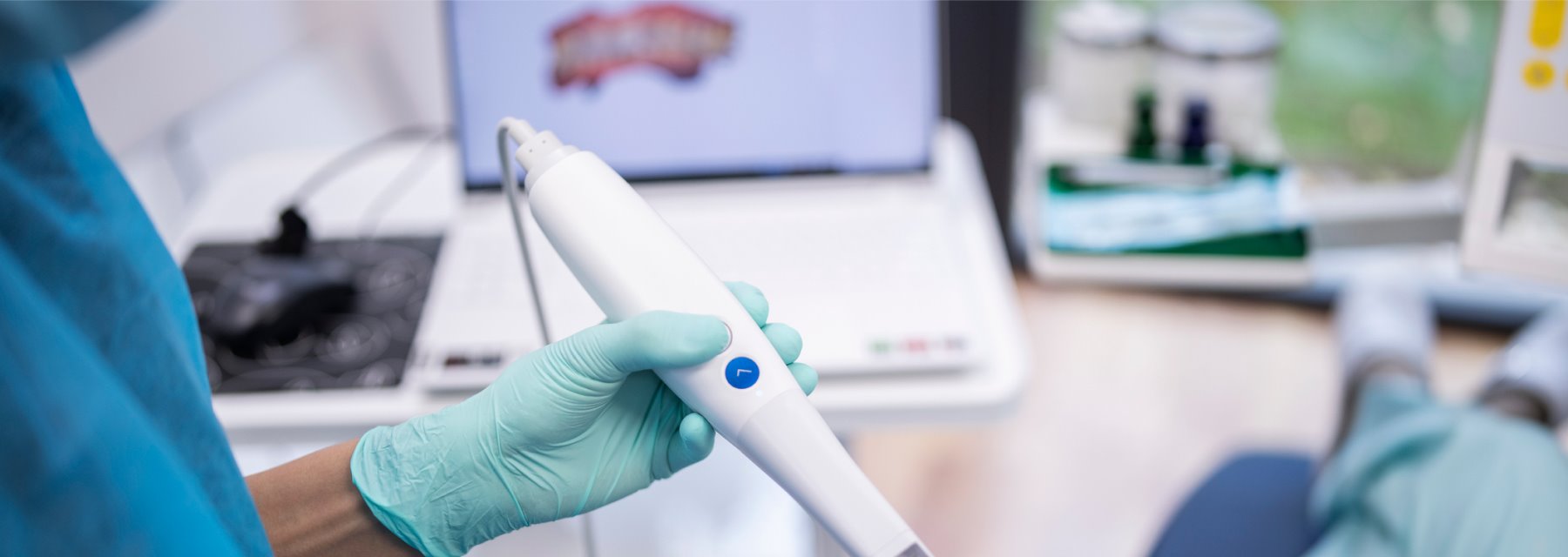 A Gloved Hand Holding A Dental 3d Scanner at Charleston West Virginia