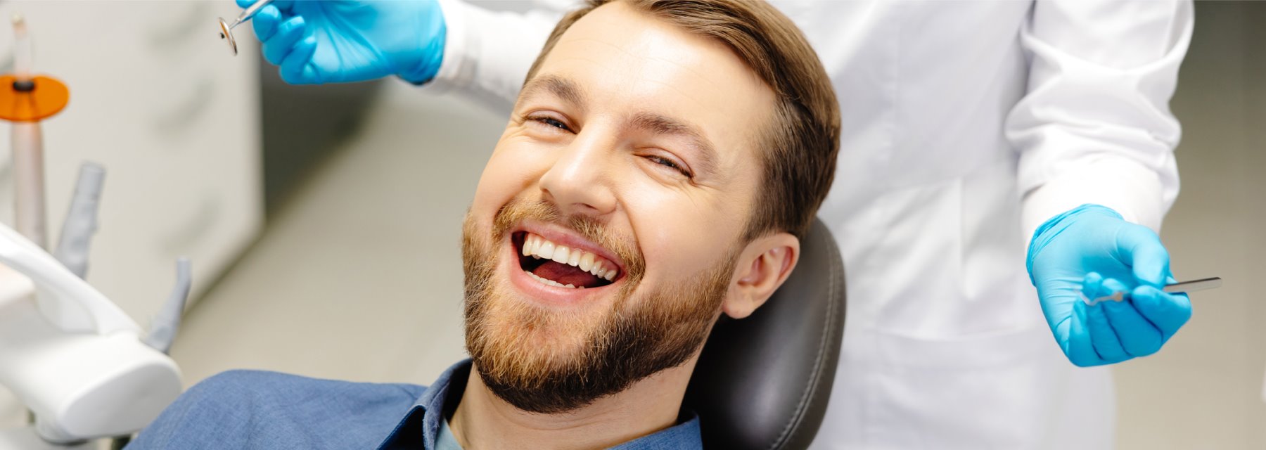 Smiling Man Relaxes In A Dentist Chair At Charleston West Virginia