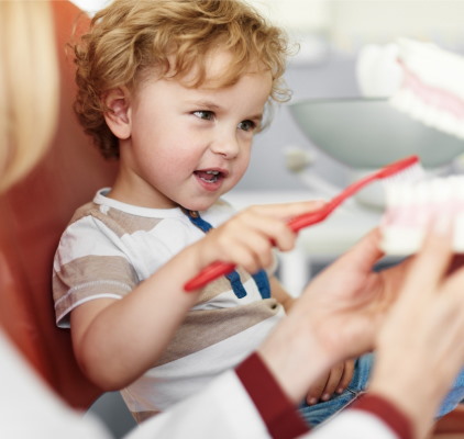 Child Sits In A Dentist Chair At Charleston West Virginia