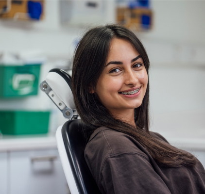 Young Woman Comfortably Seated In A Dental Chair at Kalaskey Orthodontics Charleston West Virginia